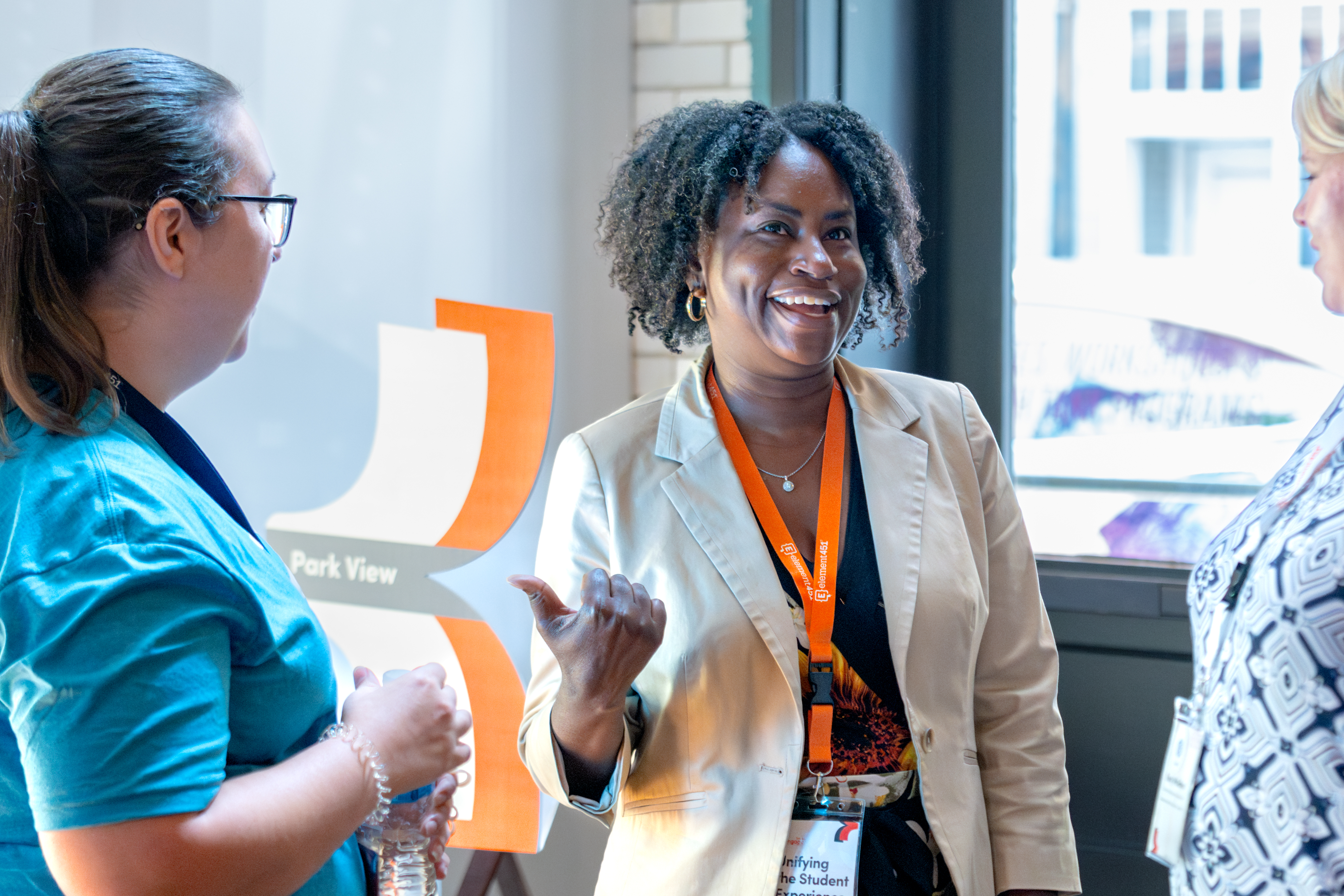 Lindsay Bowen networking with partners at Engage Summit