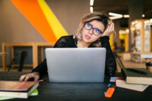 https://images.prismic.io/elevenrush/5bf7445a-e57c-4bd0-a973-6aa2a99eafe9_tired-sad-young-pretty-woman-sitting-table-working-laptop-co-working-office-wearing-glasses-stress-work-funny-emotion-student-class-room-frustration_285396-94-300x200.jpg?auto=compress,format