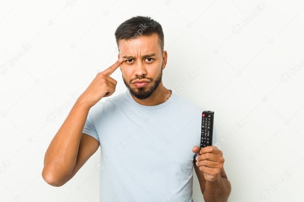 https://images.prismic.io/elevenrush/5da10341-6f88-4a04-bd9d-a20570ac70b8_young-south-asian-man-holding-tv-controller-showing-disappointment-gesture-with-forefinger_1187-87088.jpg?auto=compress,format