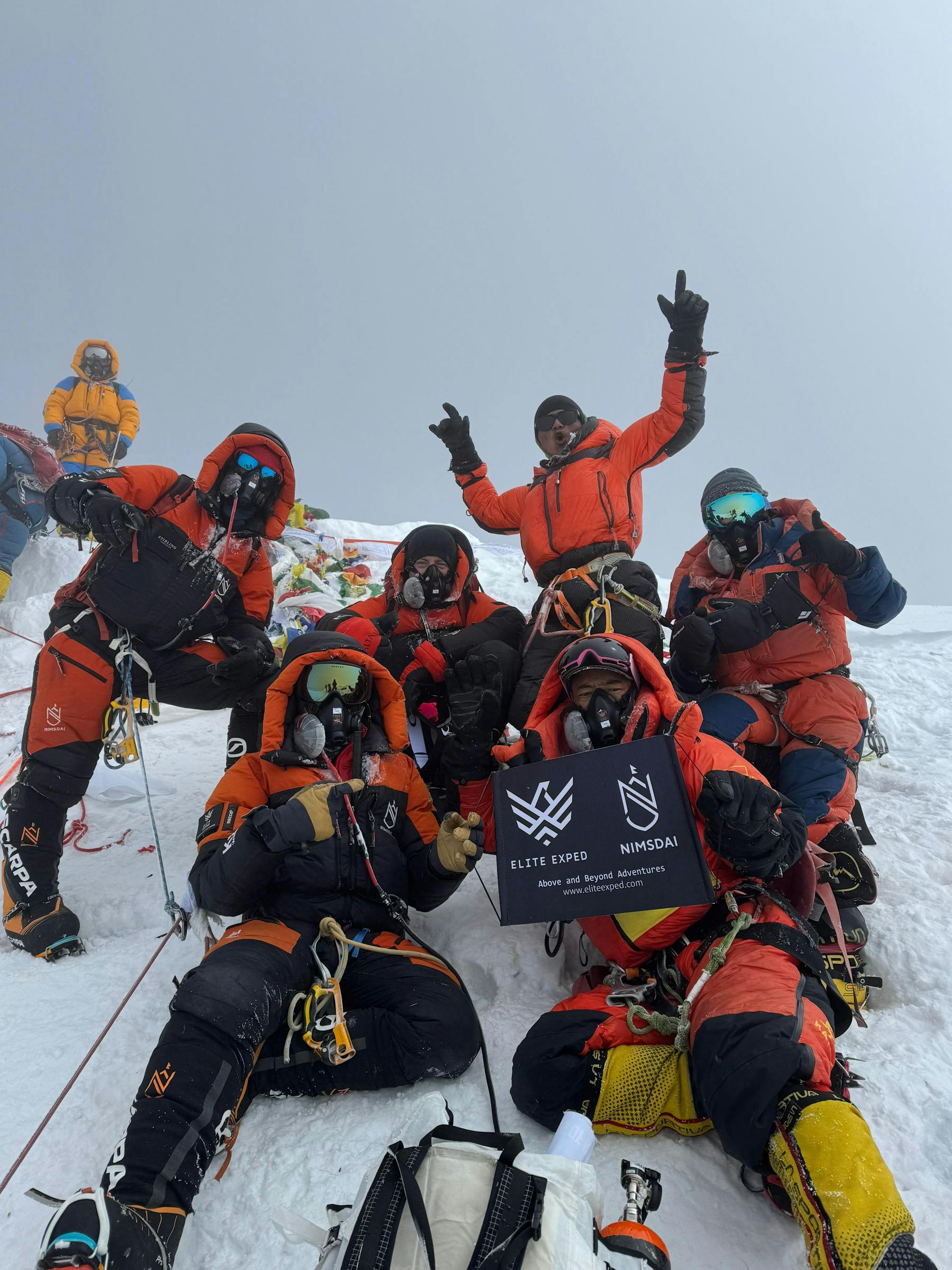 Andrew Ushakov - Elite Exped - on the summit during his fast track record on Everest