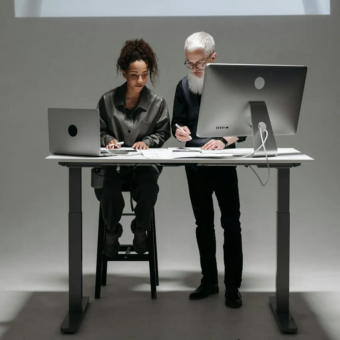 Photo by Pavel Danilyuk: https://www.pexels.com/photo/people-working-on-computers-8000522/