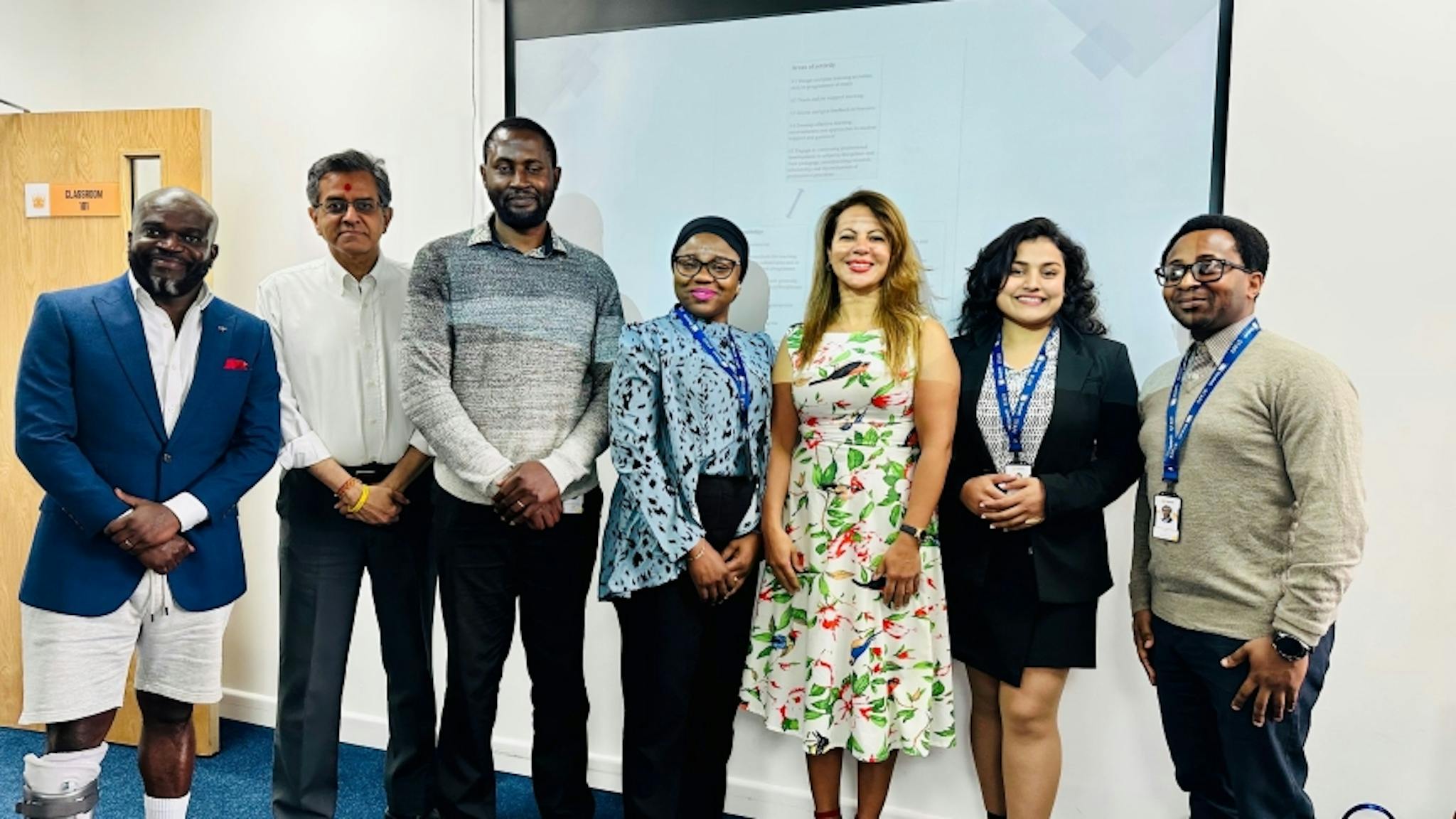 Elizabeth School of London staff members standing after the end of the workshop.