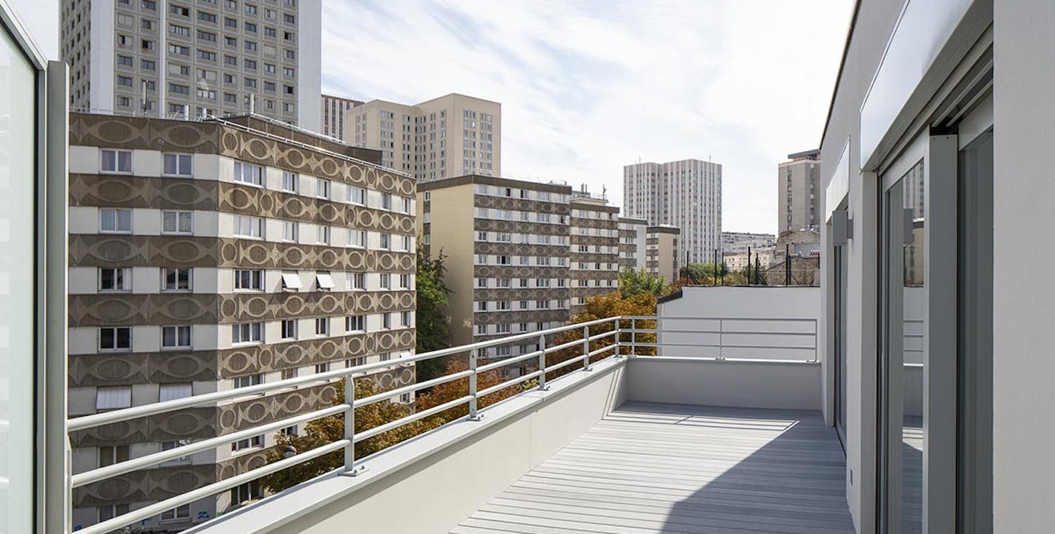 Terrasse d'un appartement neuf à Paris 19 dans la résidence 23 Crimée
