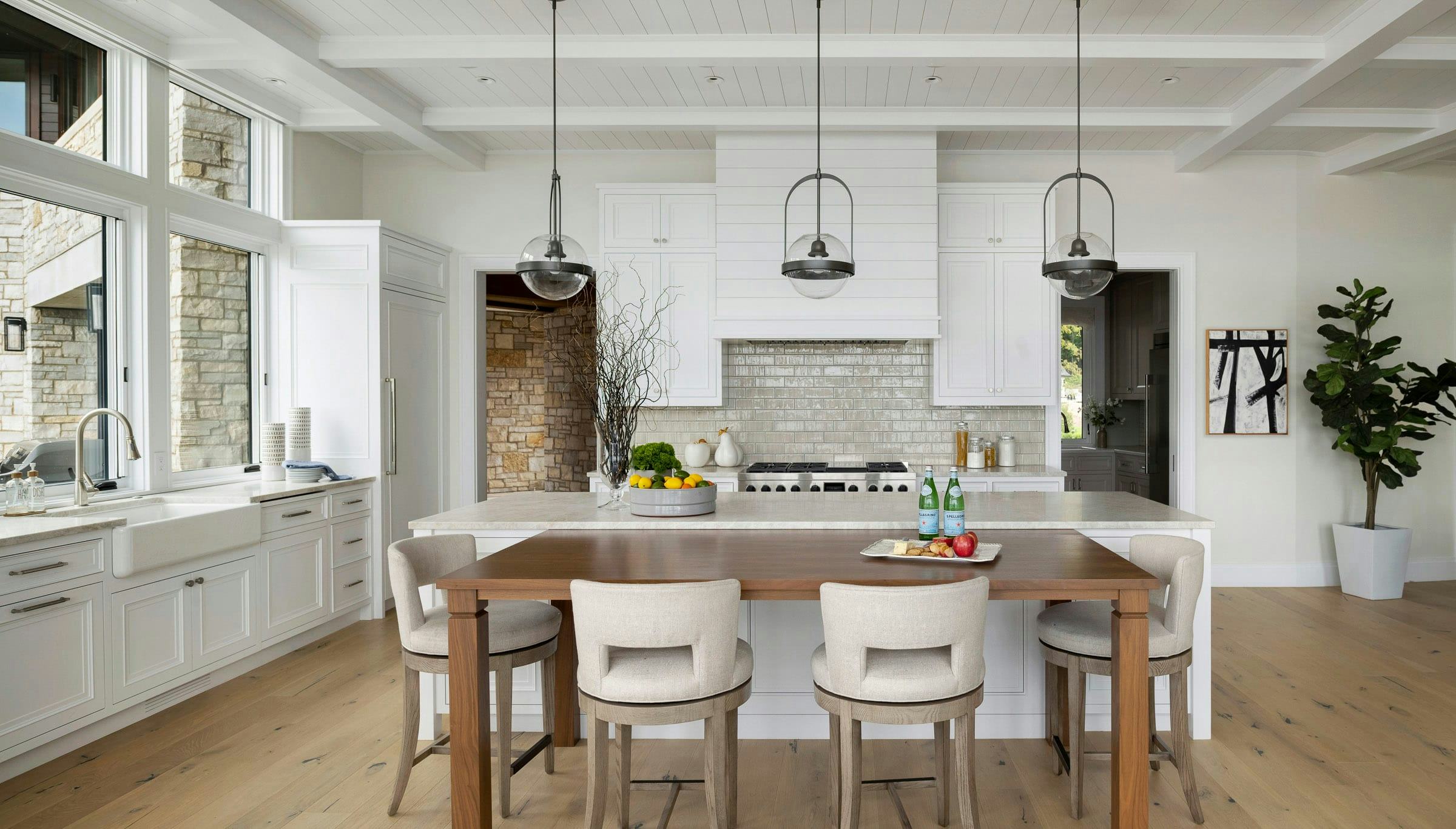 white kitchen, island and table