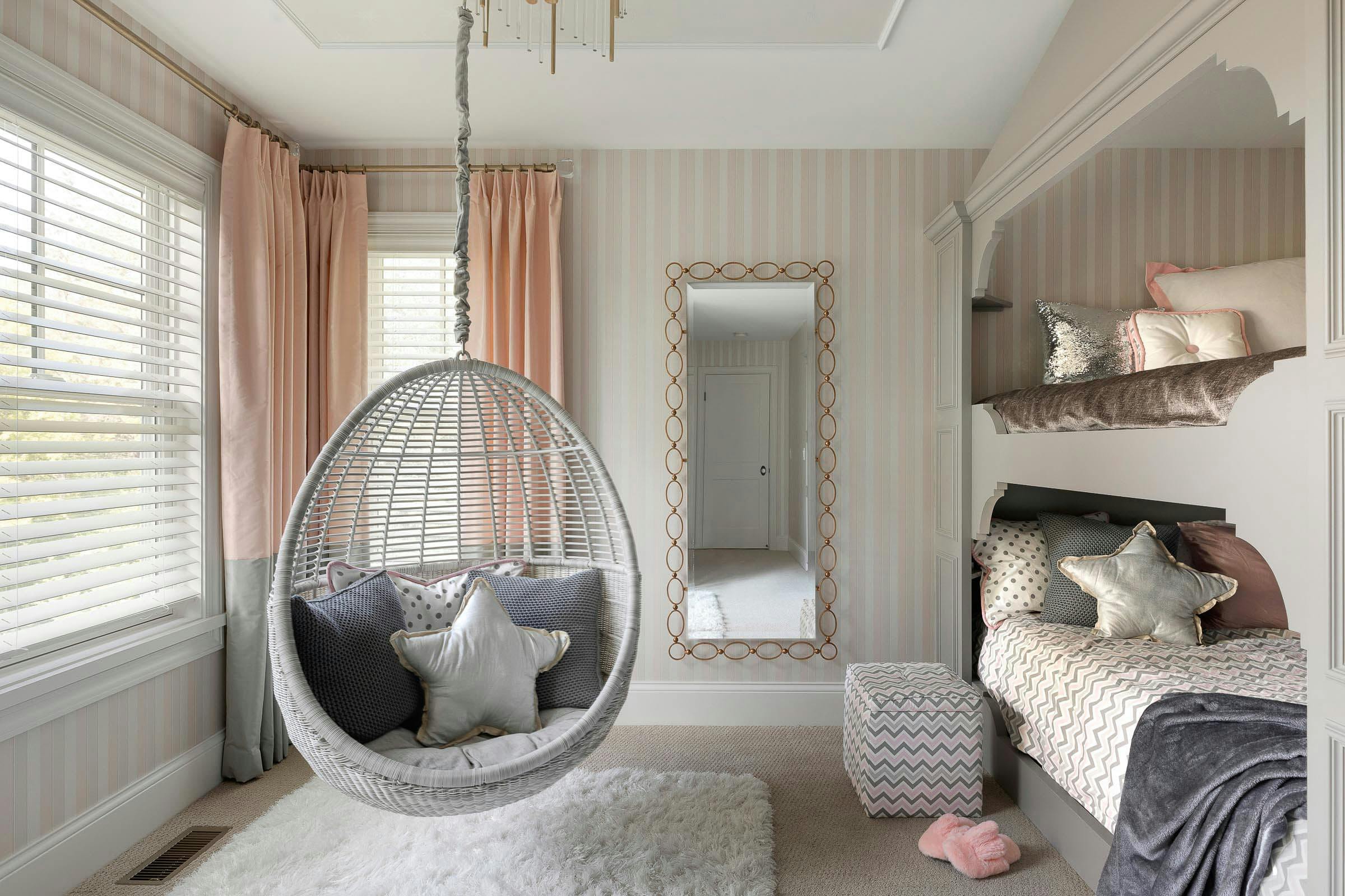 daughter's room with two queen built-ins, hanging chair