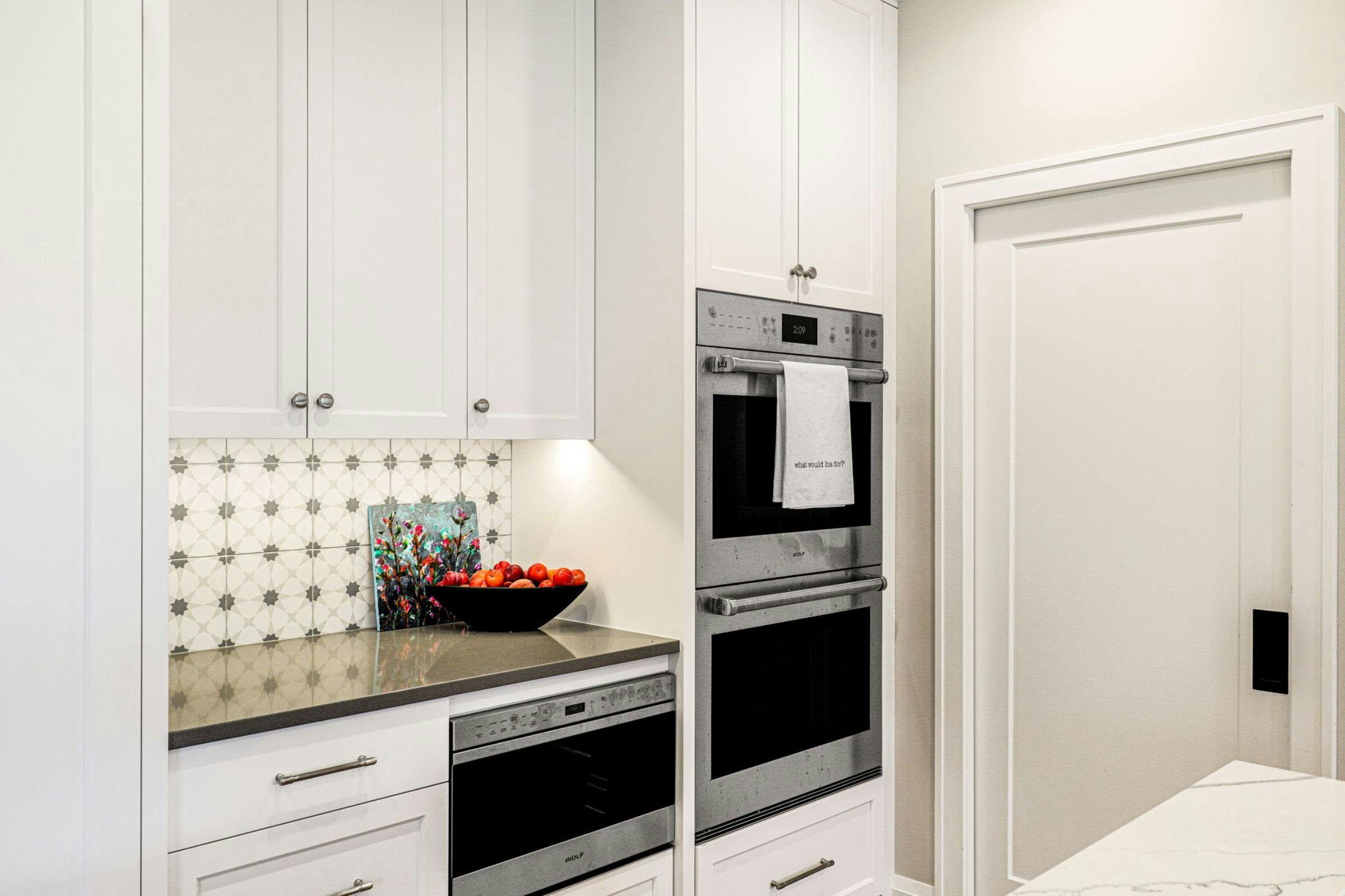 white cabinets and wall oven