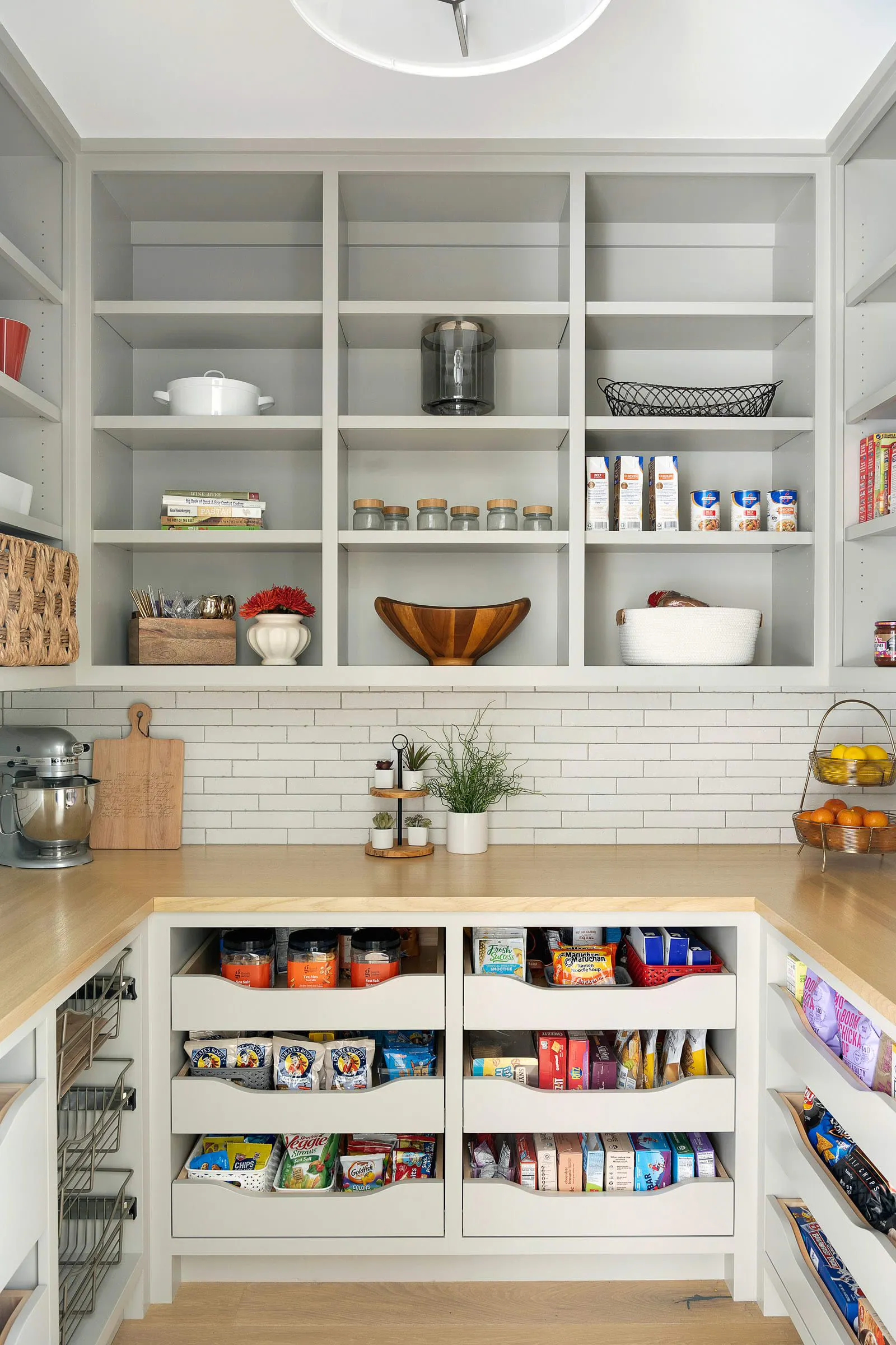 light color pantry design with pull out shelving
