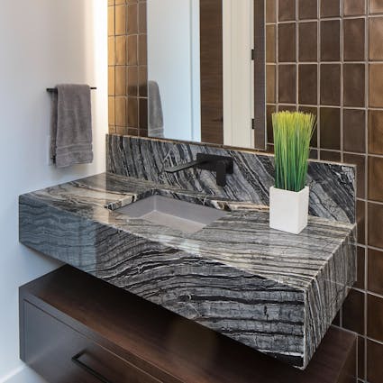 floating grey marble top in powder room