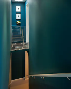 stairs leading down a level, stair bridge that leads to the pantry