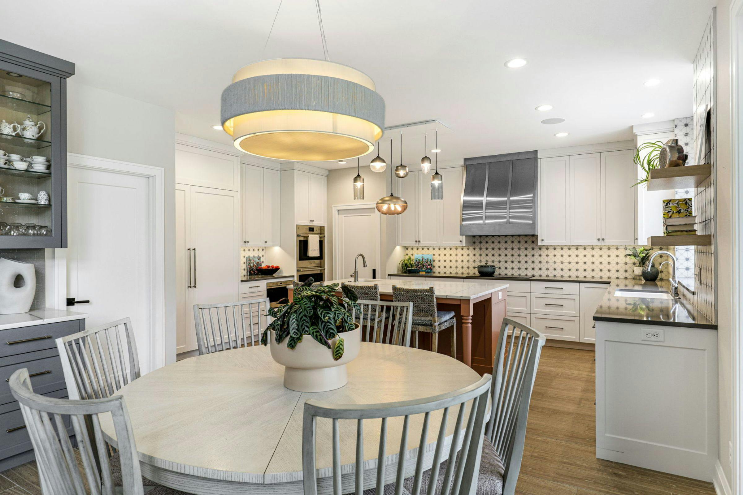 circle dining table off of the kitchen