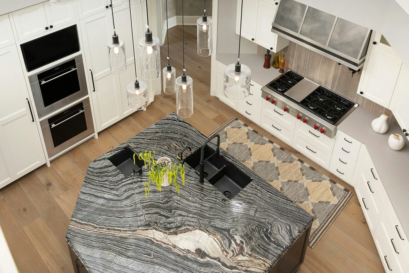 view from above looking at the kitchen, irregular shaped island