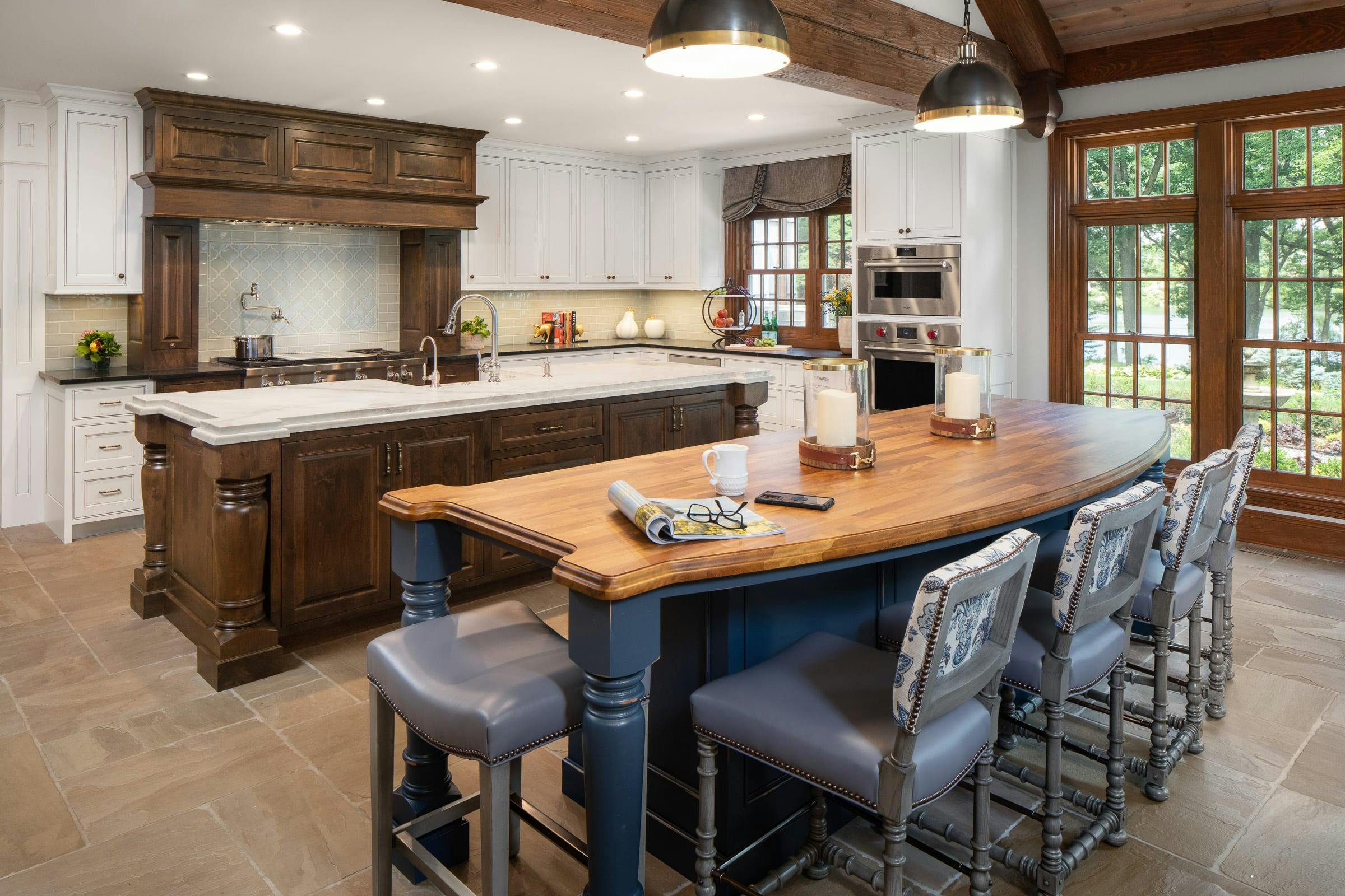kitchen with two islands, white cabinets