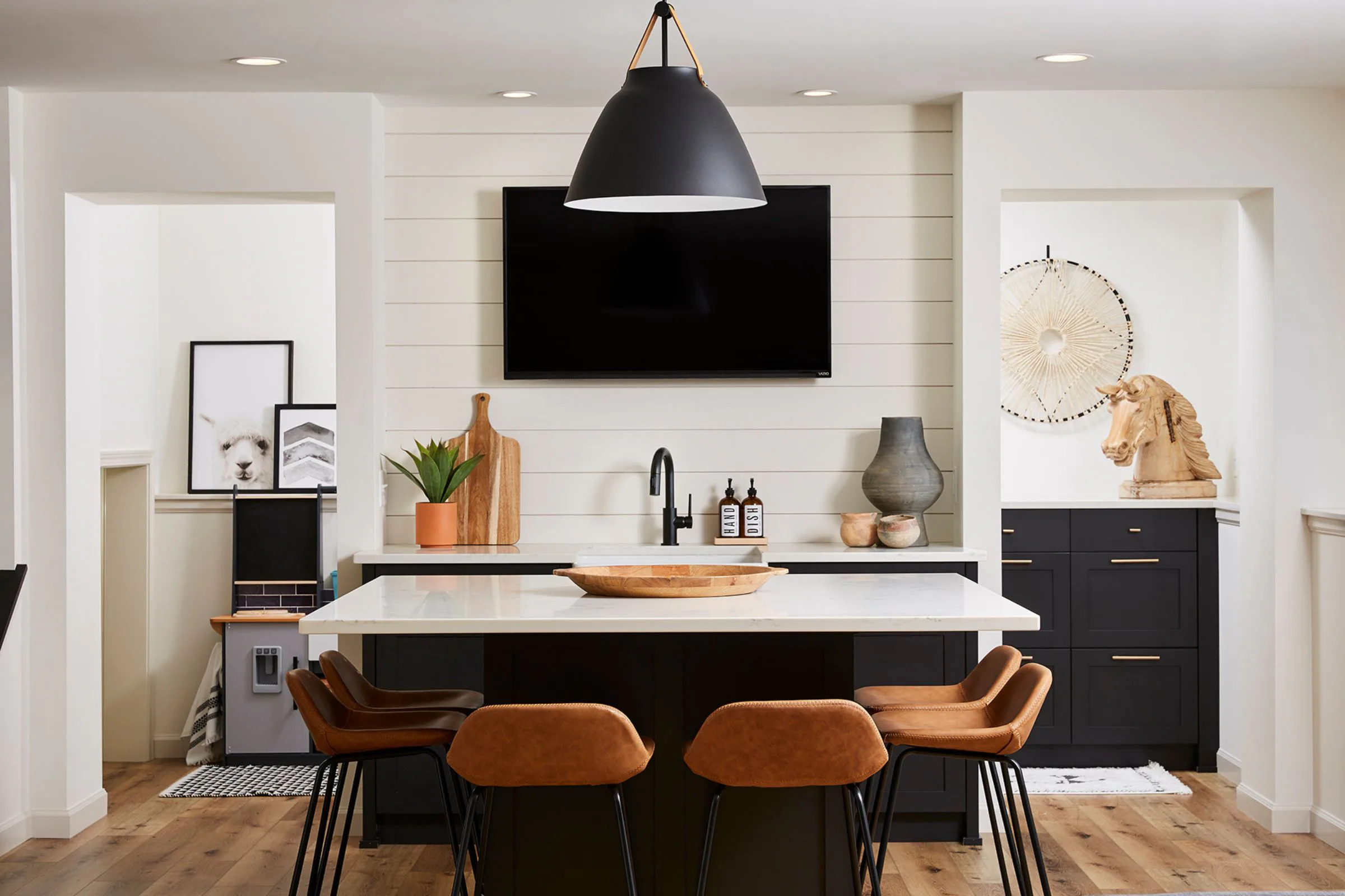 black and white kitchen design with leather details