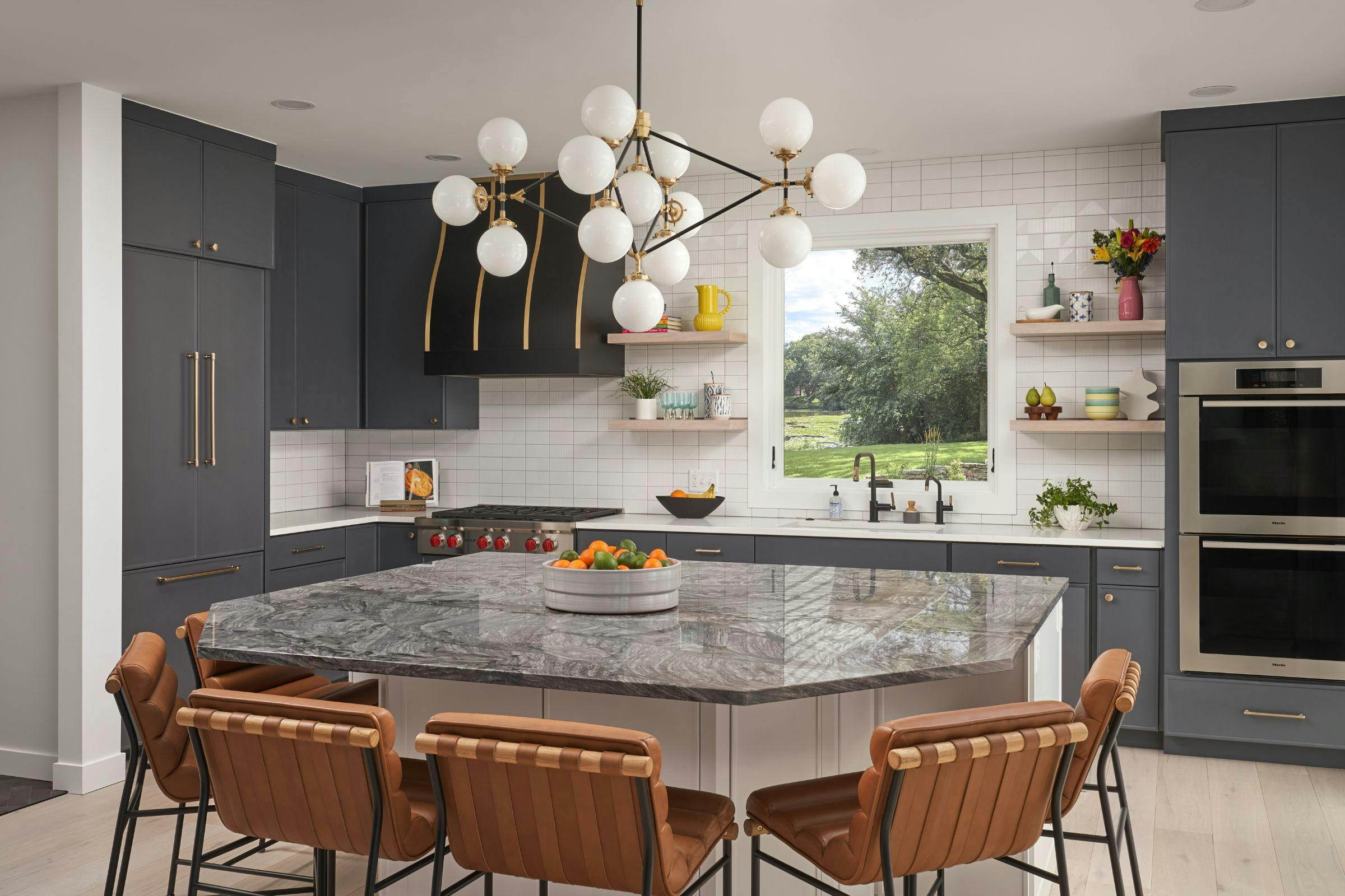 black and white kitchen design, large island with chairs