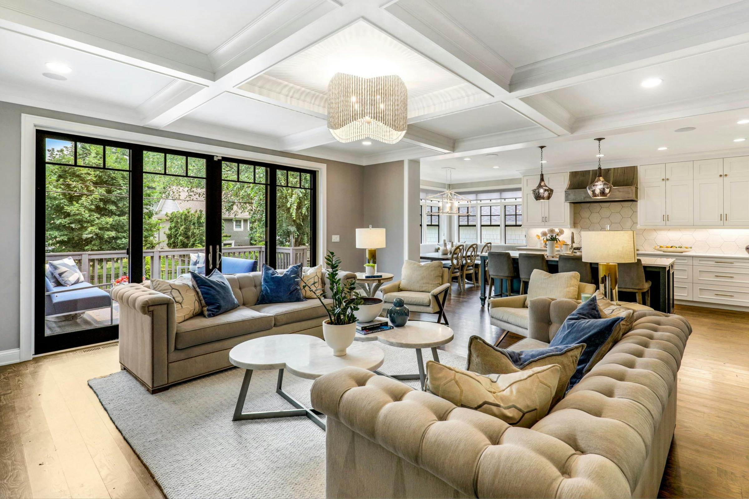 living room with two sofas, two coffee tables