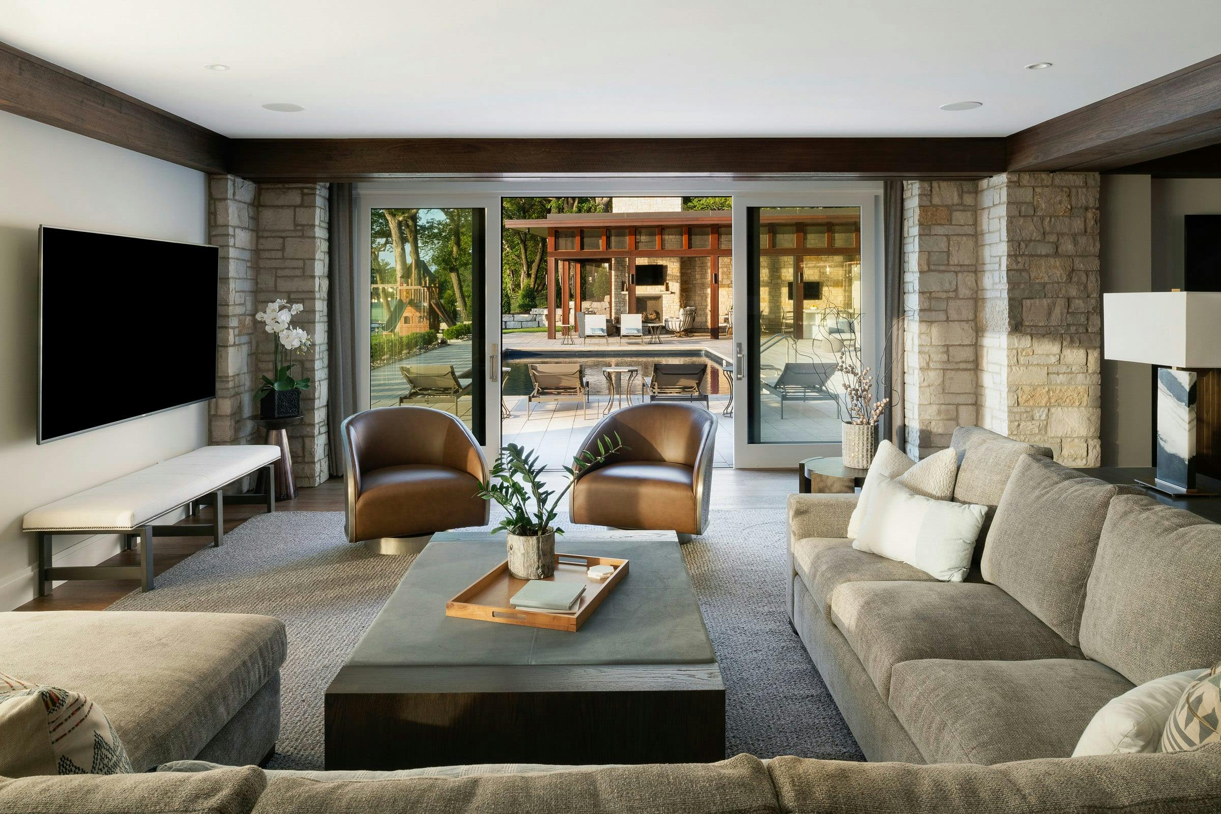 family room pocket doors leading to swimming pool
