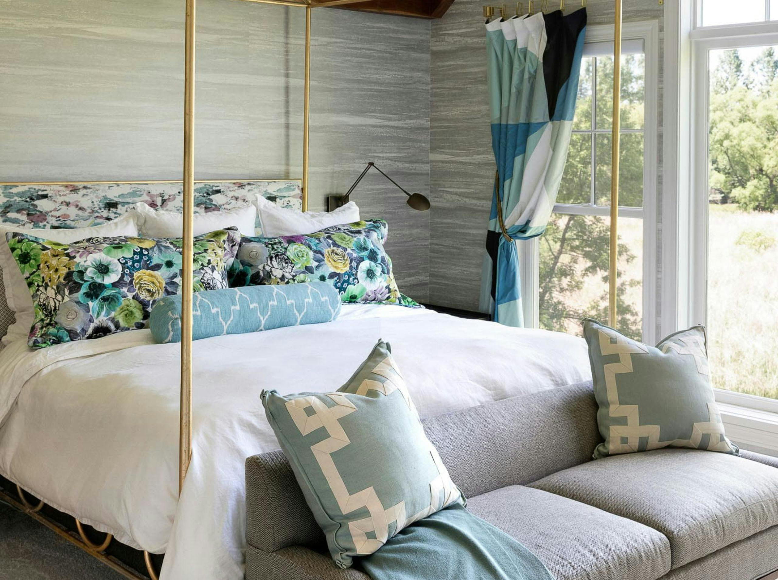 Floral pillows and an inviting bench