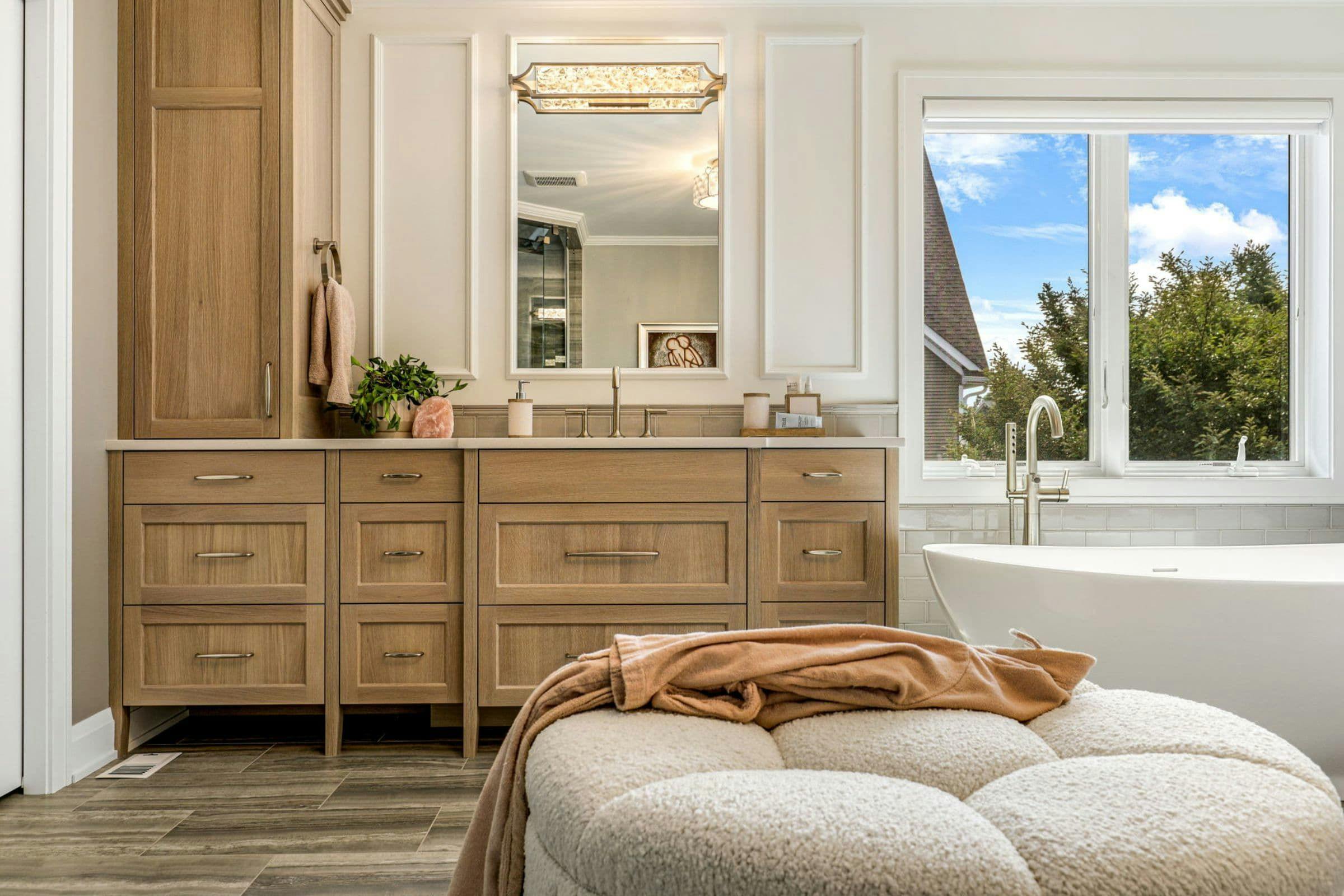 bathroom vanity with ottoman and blanket