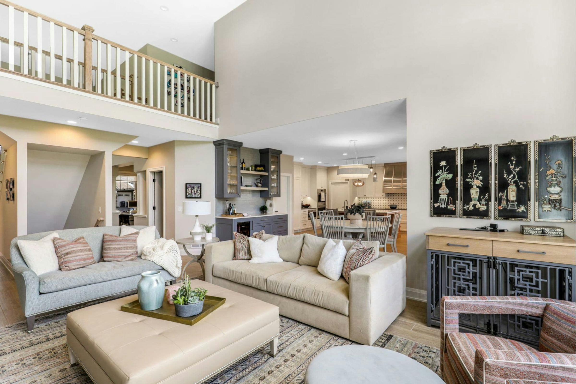 living room with two sofas highlight the use of neutral colors