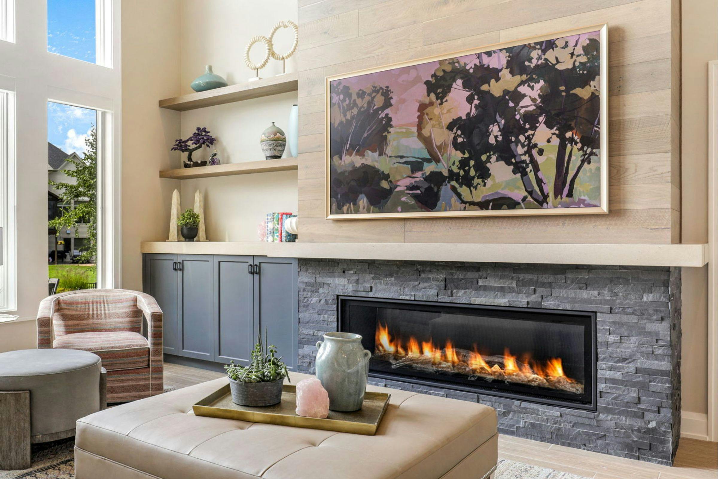 living room with fireplace and TV frame