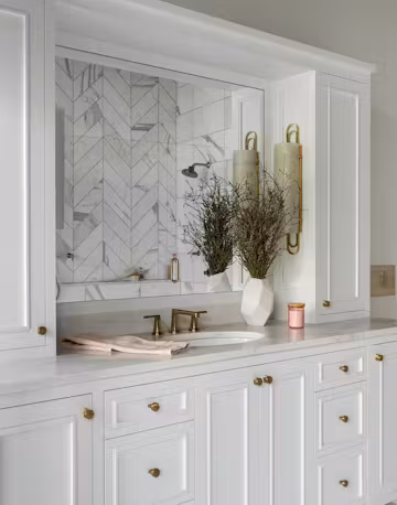 bathroom with custom vanity and mirror