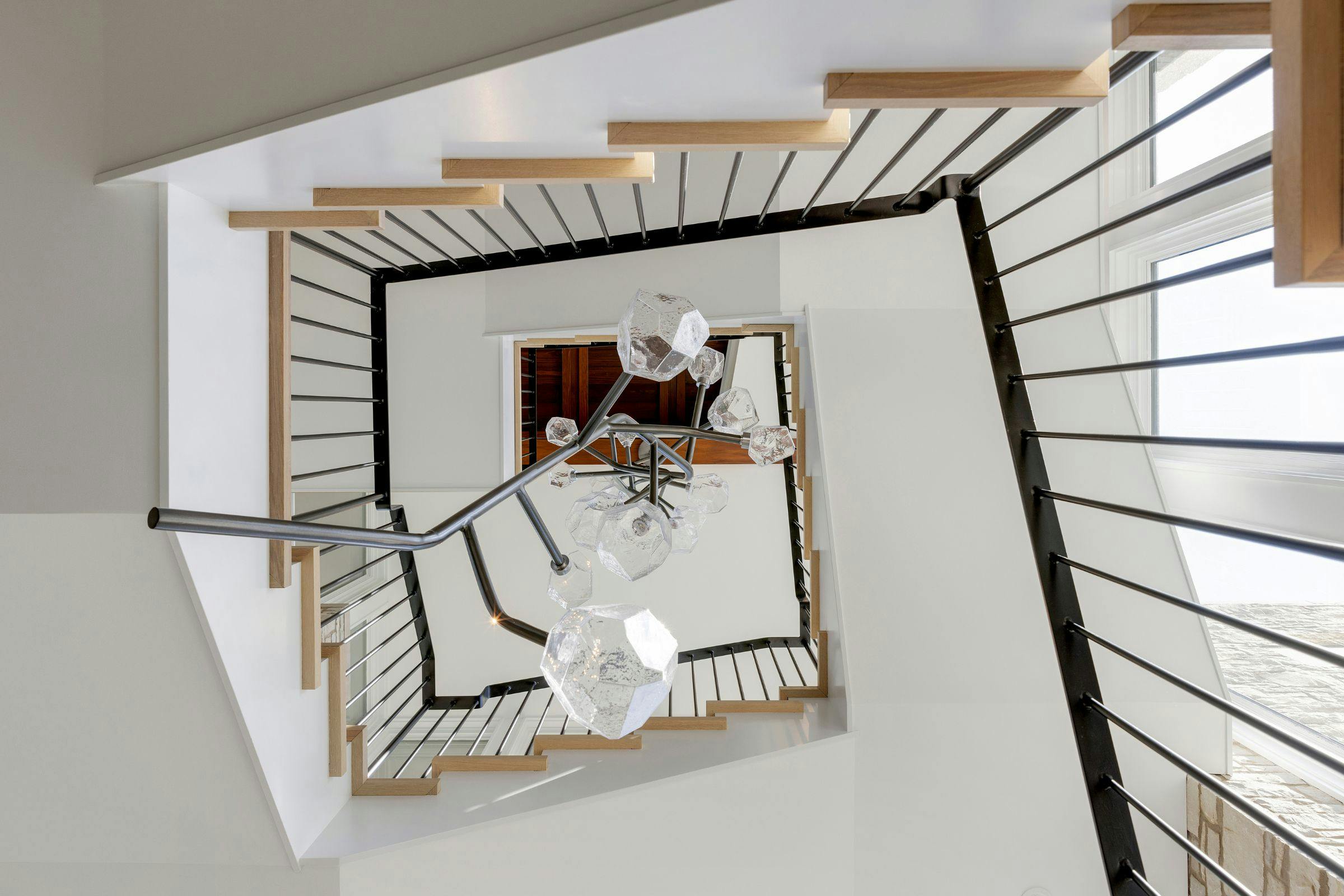 stairwell looking up at a light fixture