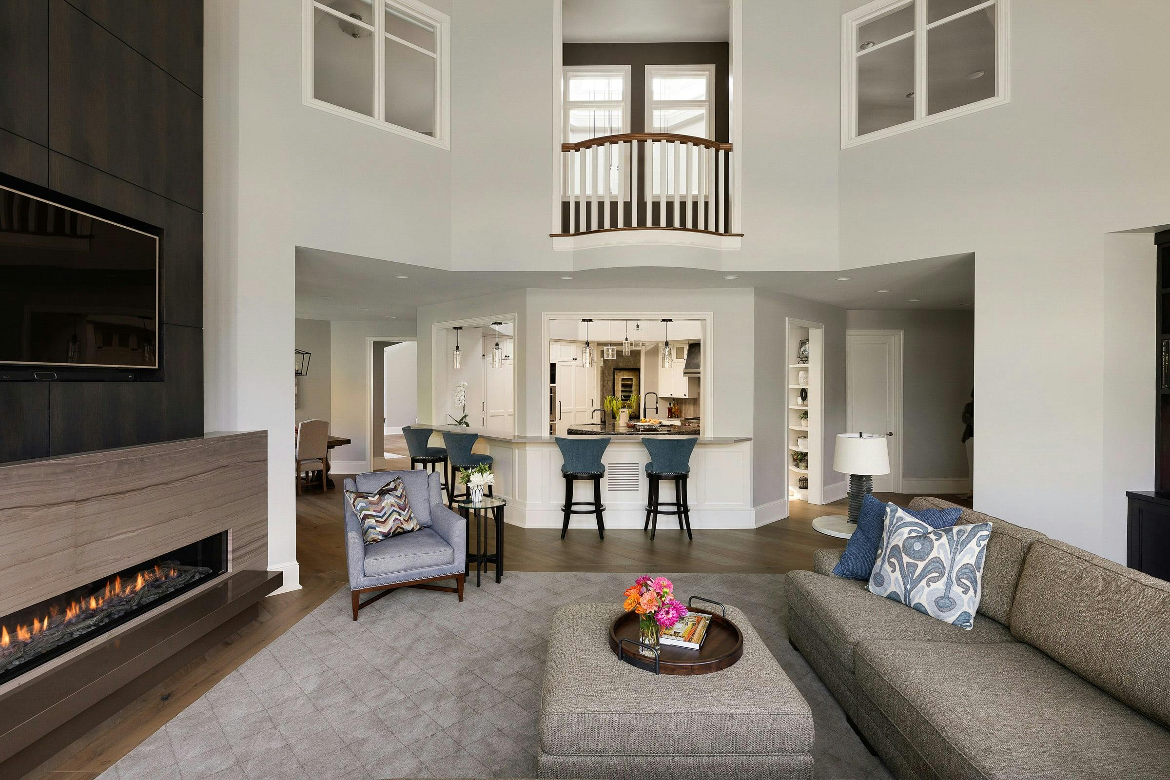 family room looking in the kitchen, tall ceilings with interior windows