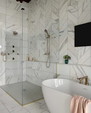 white tub, glass shower