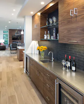 hallway with countertops and cabinets