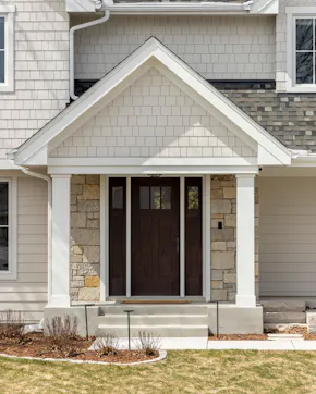 Front entry remodel with added overhang and steps enhancing curb appeal