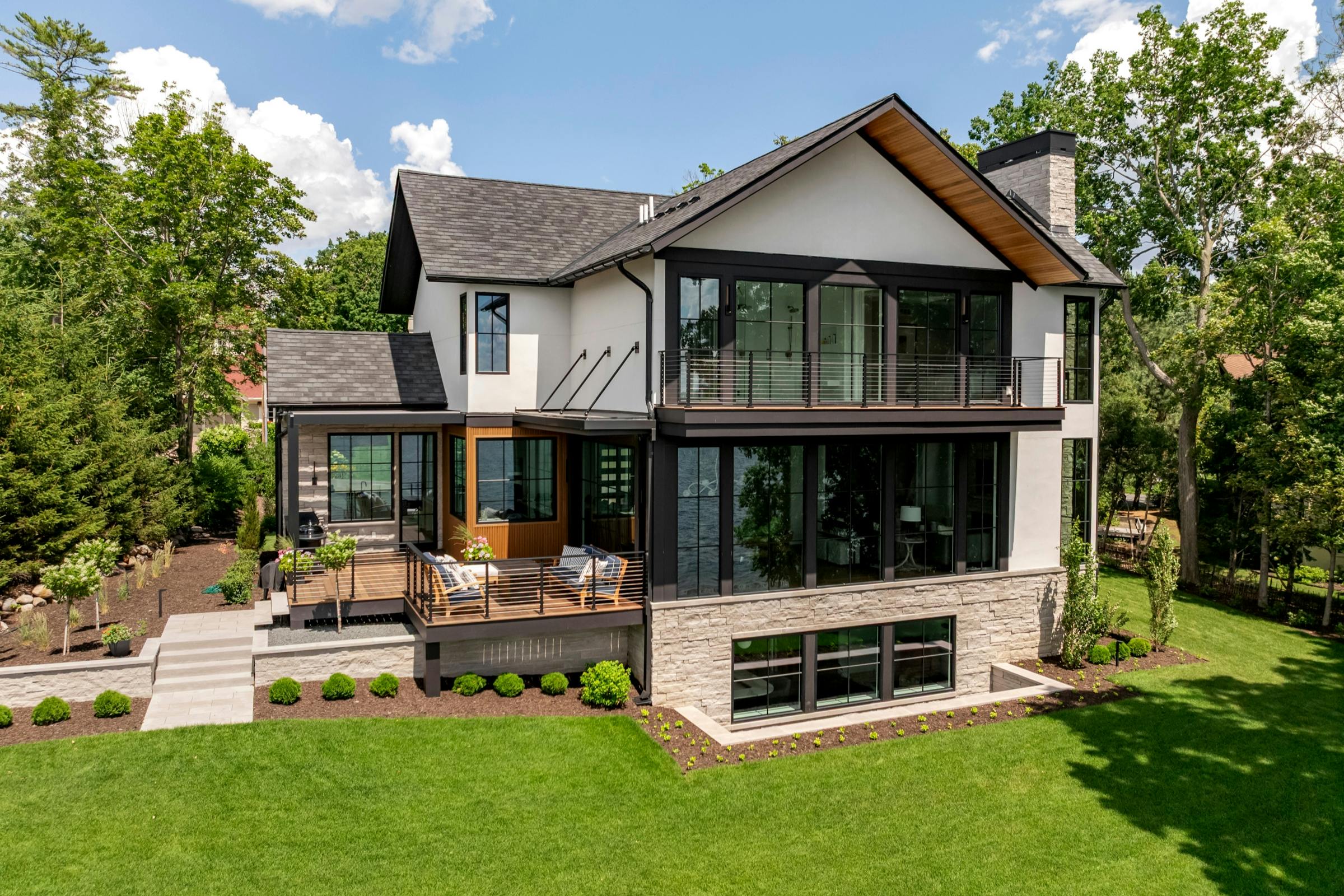 Contemporary new construction home on Lake Minnetonka with floor-to-ceiling windows and clean architectural lines