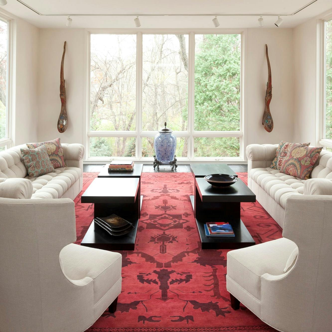 living room with red rug