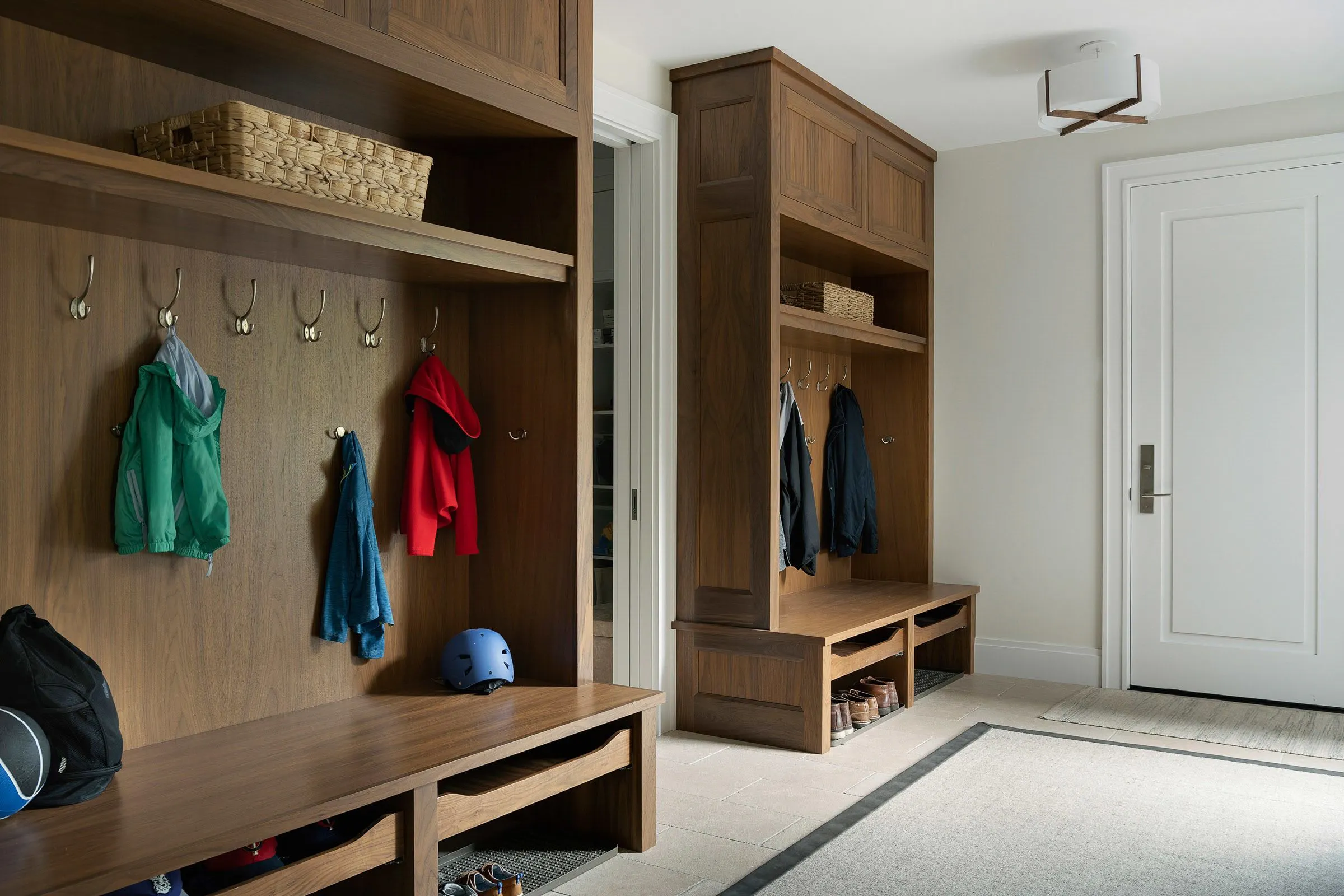 Family mudroom with cubbies, bench seating, and durable flooring