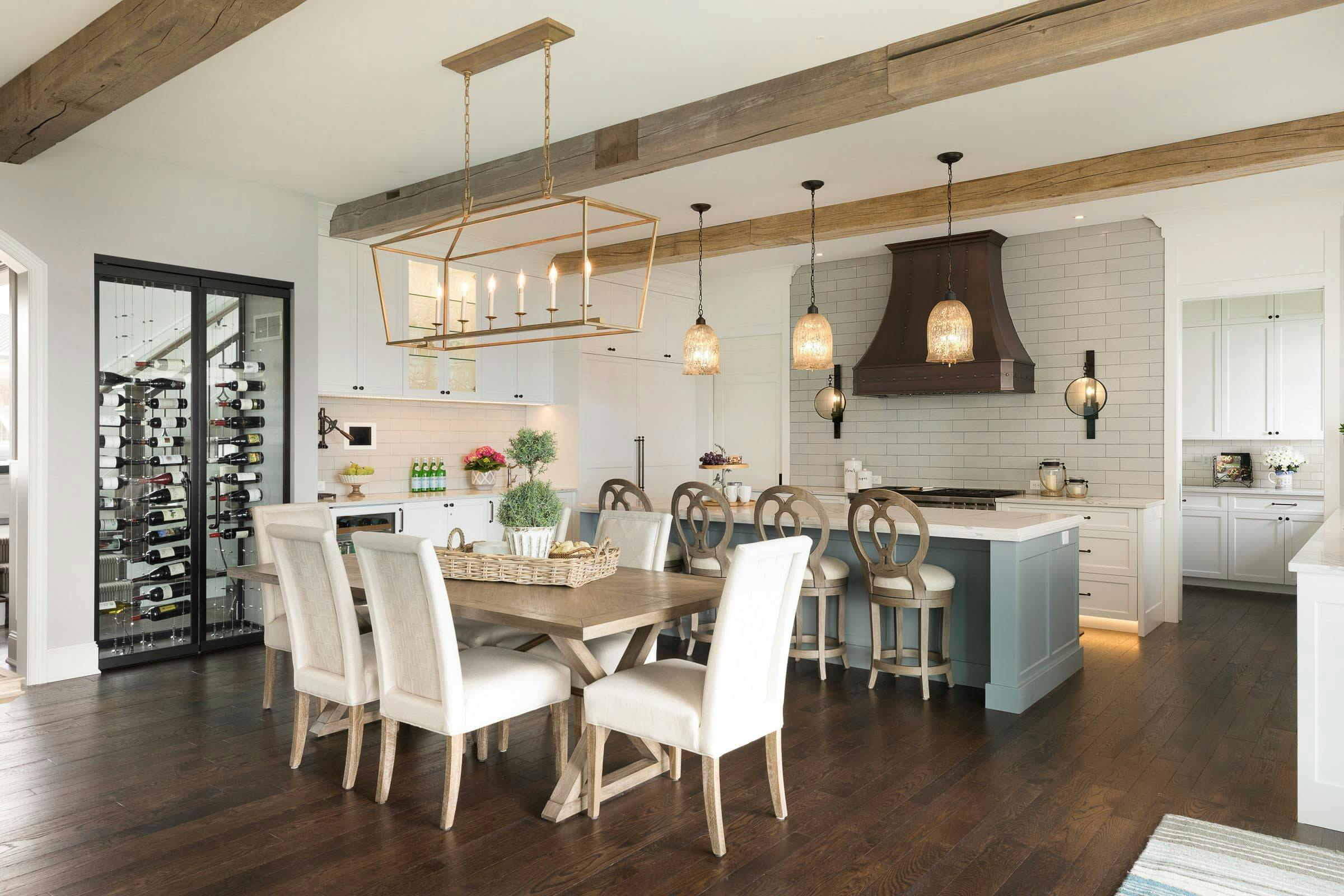 Kitchen with neutral countertops, wall color and white subway tile