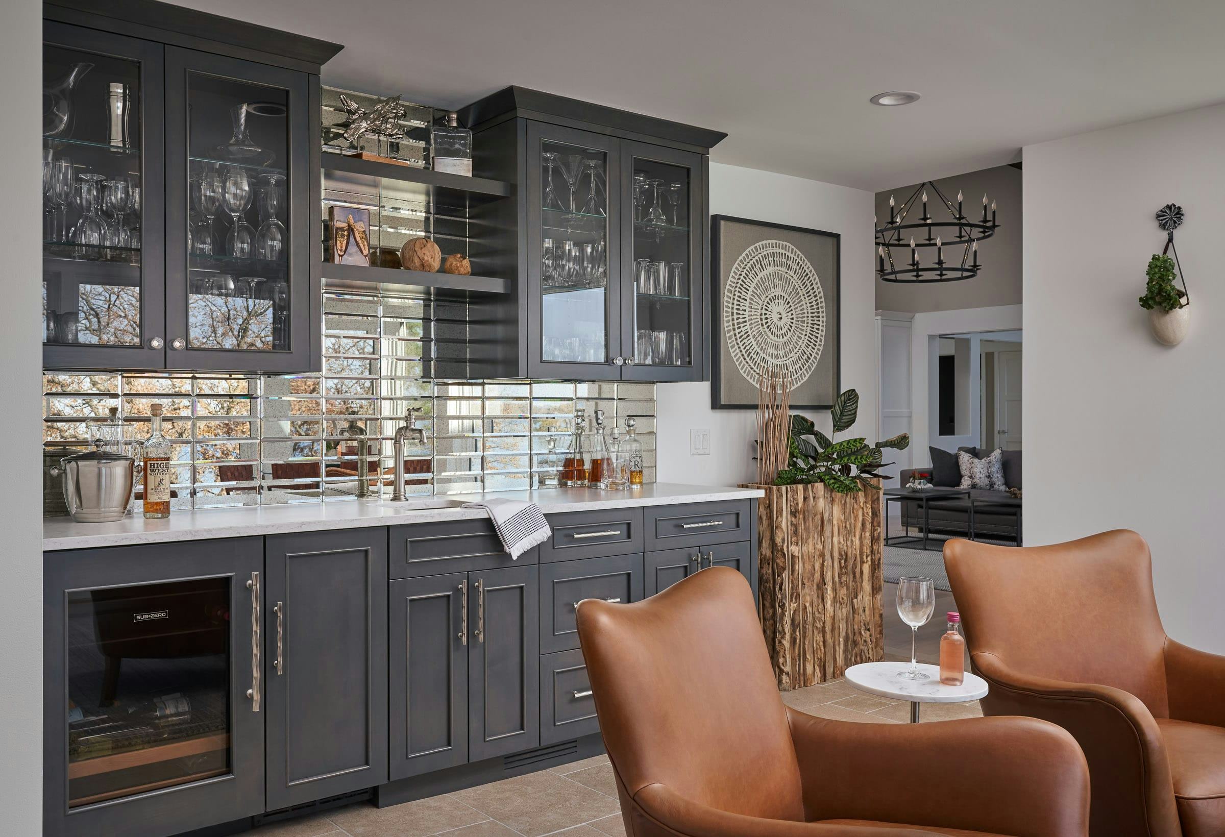 gray cabinets, orange leather chairs in bar room