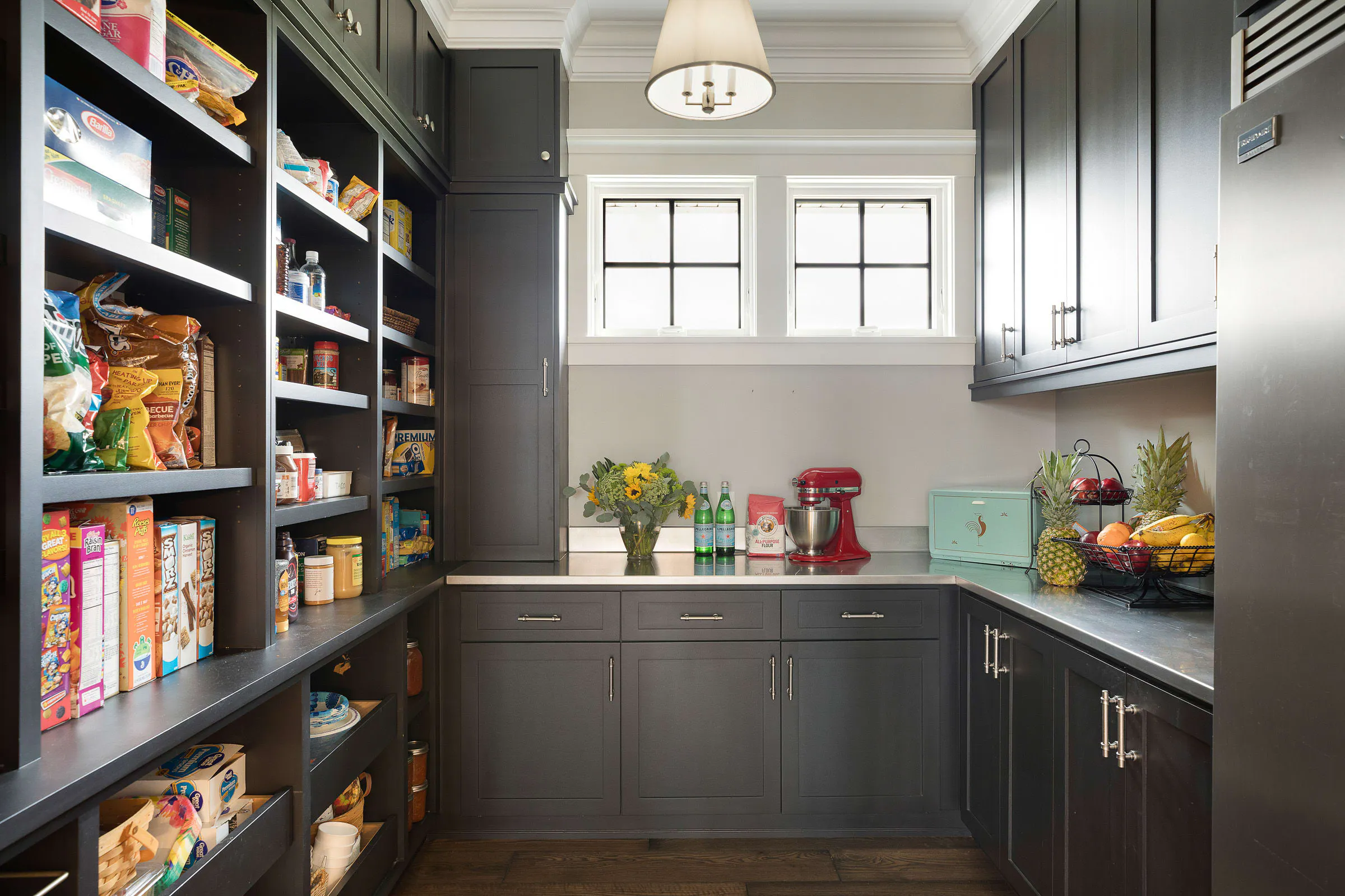 gray walk in pantry with food storage