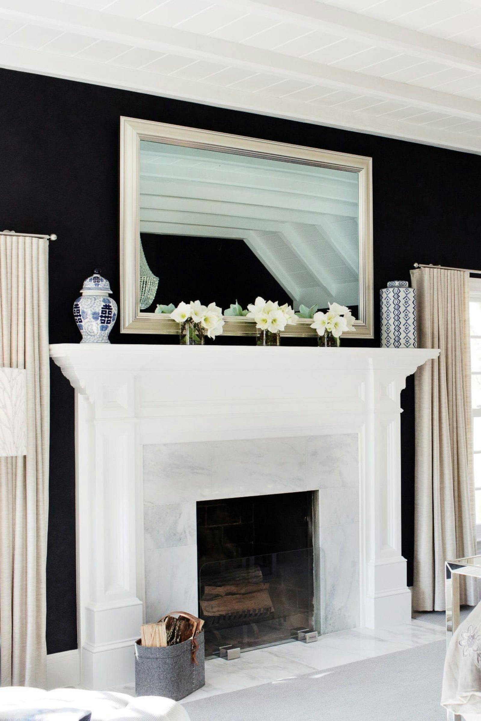 fireplace with Tv that looks like a mirror