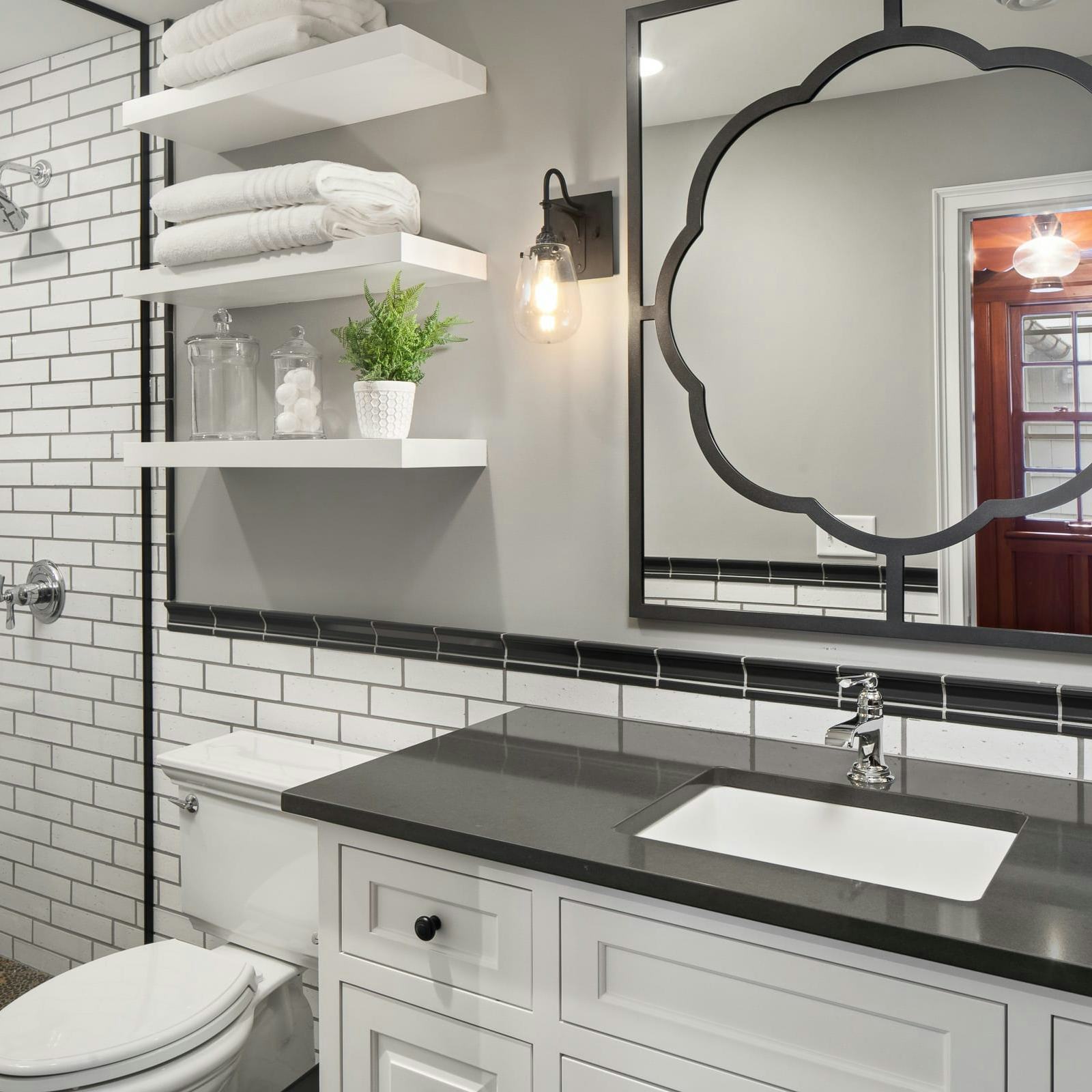 modern black and white bathroom, subway tile, shower, vanity