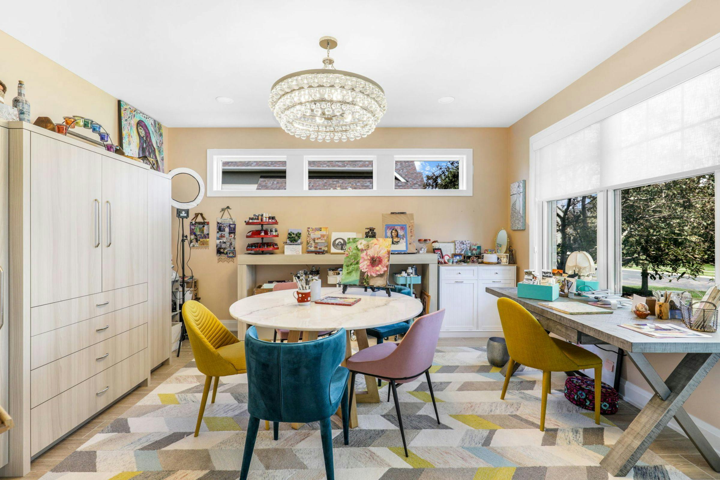 circle table with chairs, desk, storage
