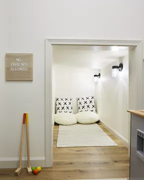 kid's play space under the stairs