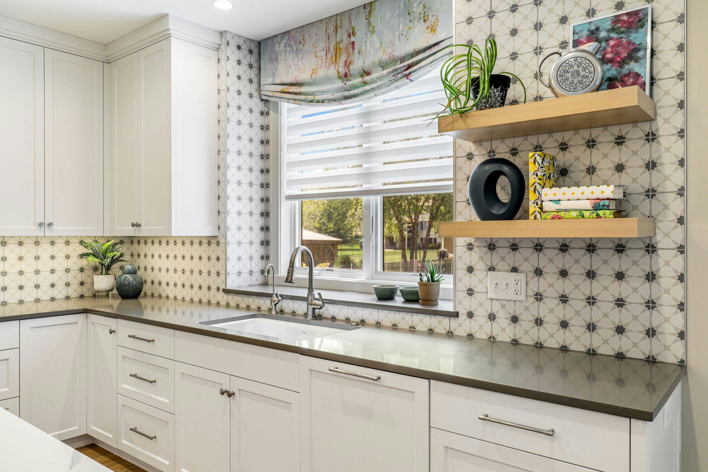 white and gray kitchen sink and window