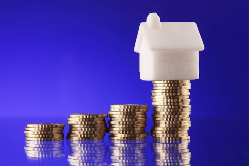 House standing on the coins
