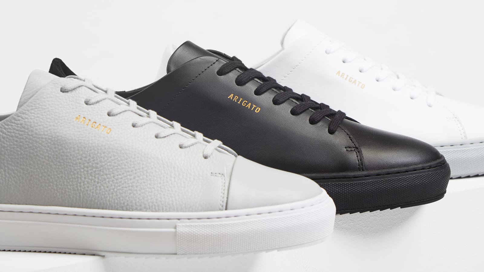 Axel arigato perforated hot sale leather sneakers