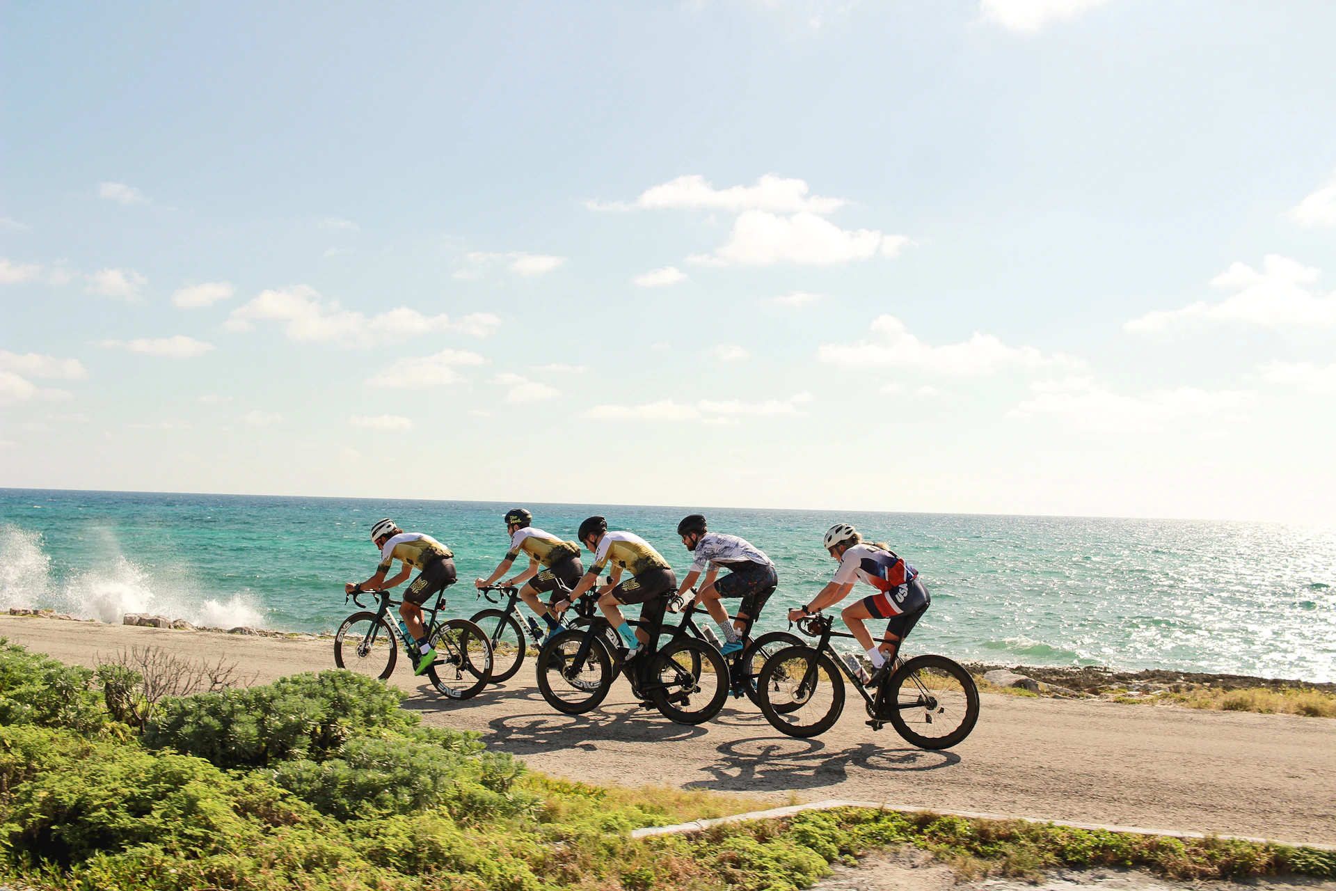 EndureAll Athletes riding bikes in peloton in Cozumel MX
