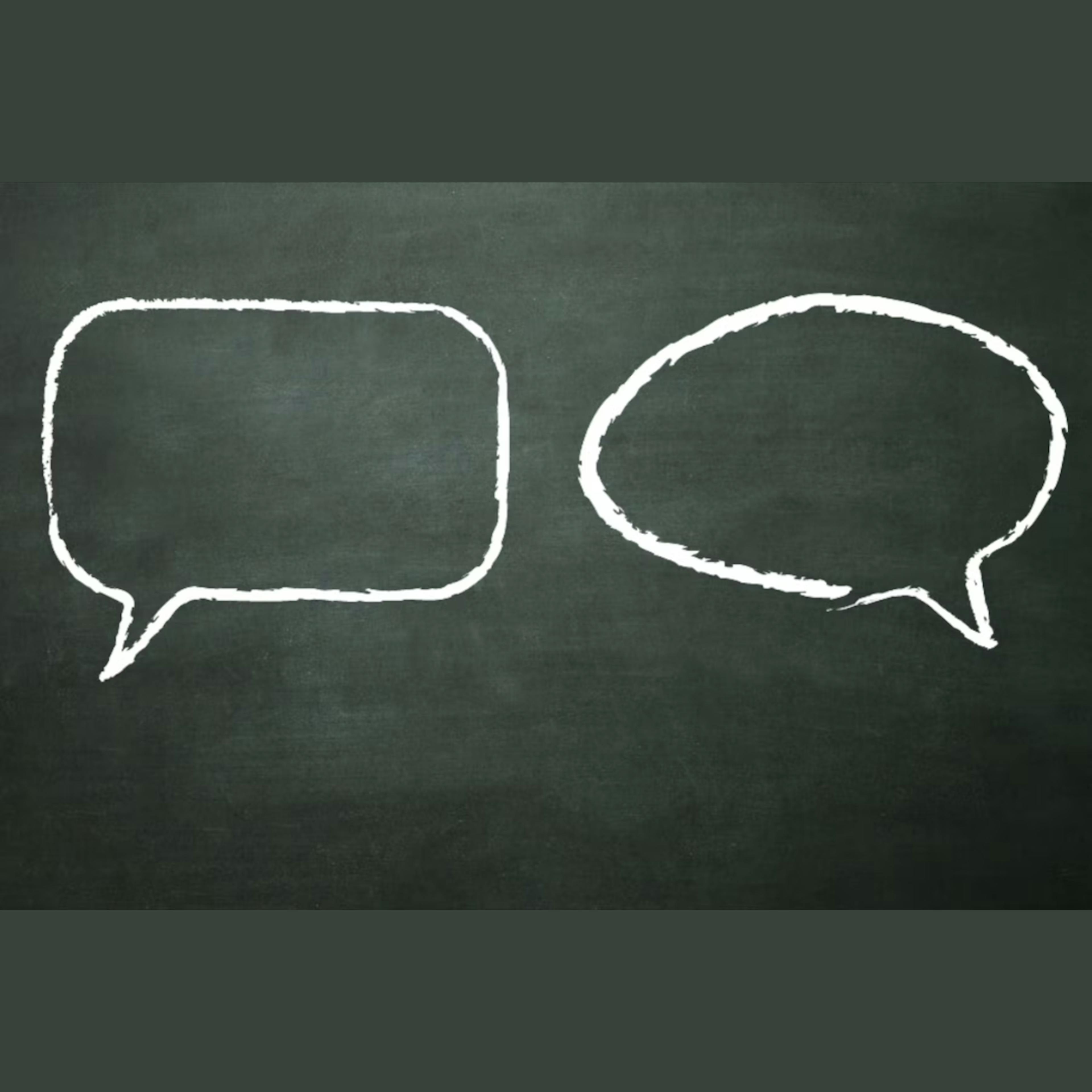 two chalk speech bubbles on a chalk board