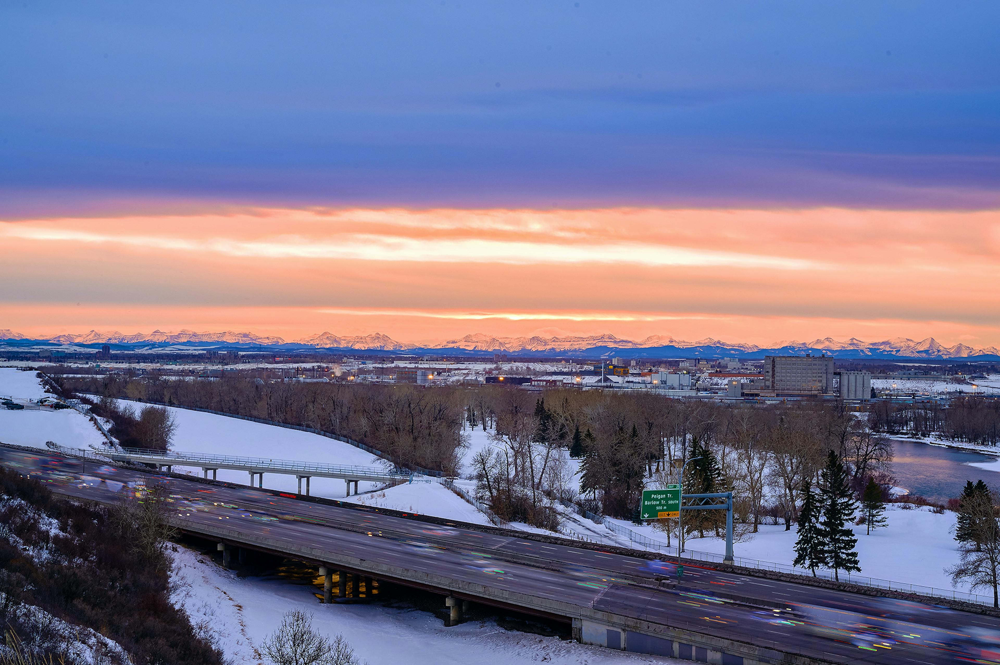 Calgary highway with mountains in background