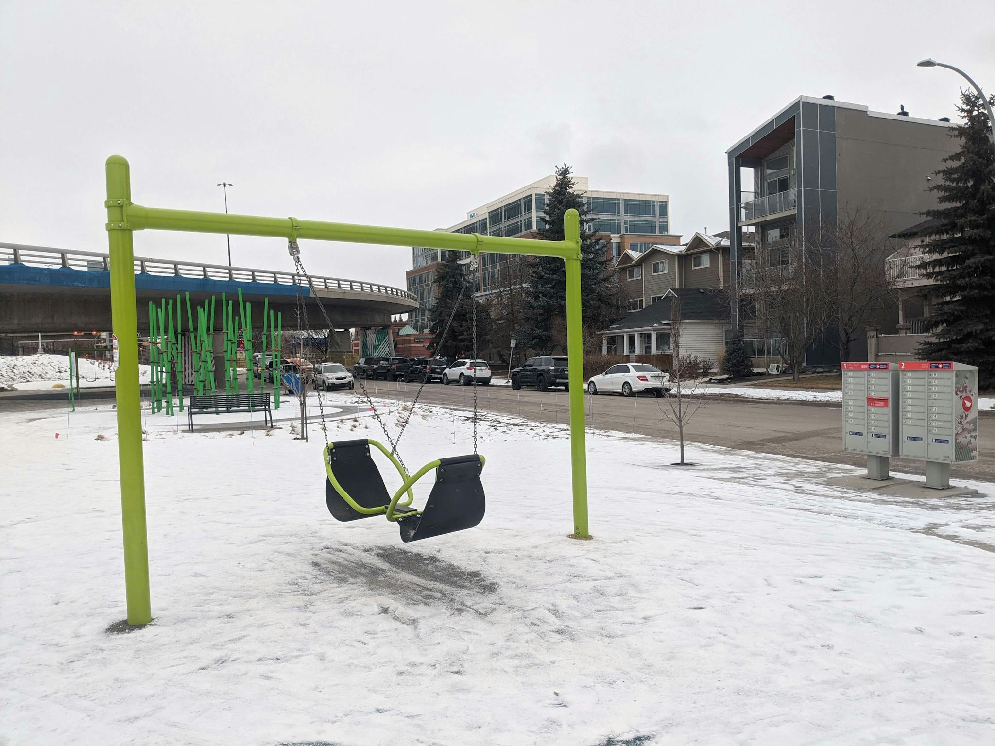 An empty swing in a park off Memorial