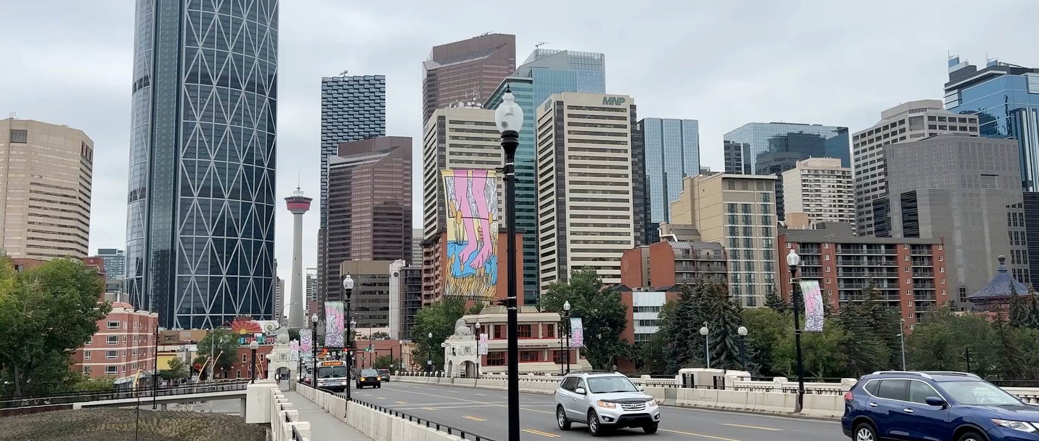 Downtown Calgary as viewed from an overpass on an overcast day.