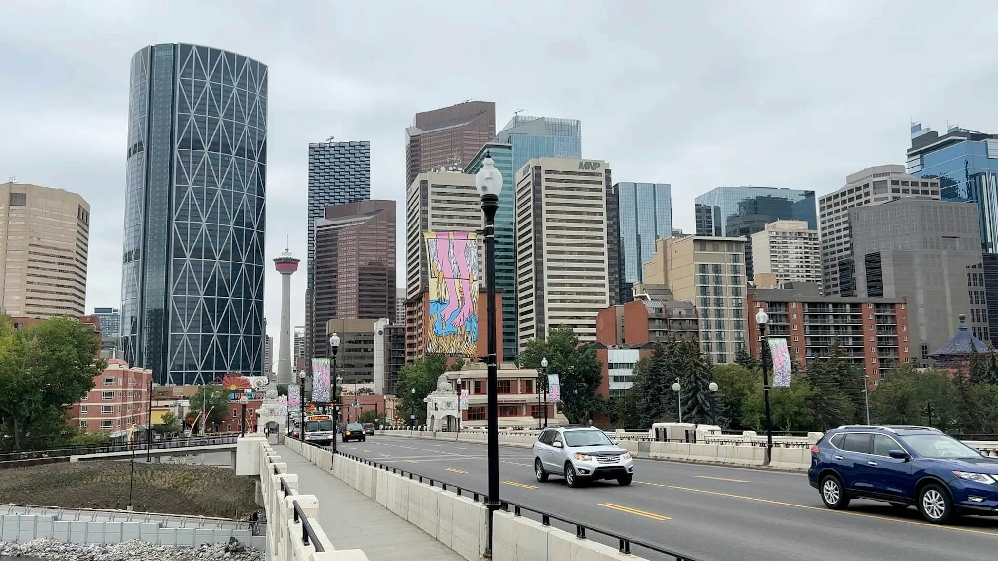 Downtown Calgary as viewed from an overpass on an overcast day.