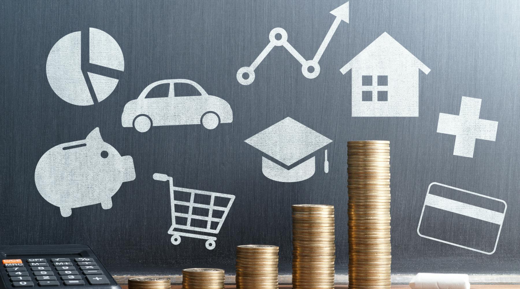 Stacked coins increasing with chalk drawn icons in the background for housing, savings, education and groceries.